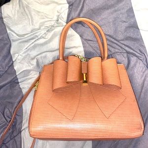 Pink “Like Dreams” purse with detachable shoulder strap